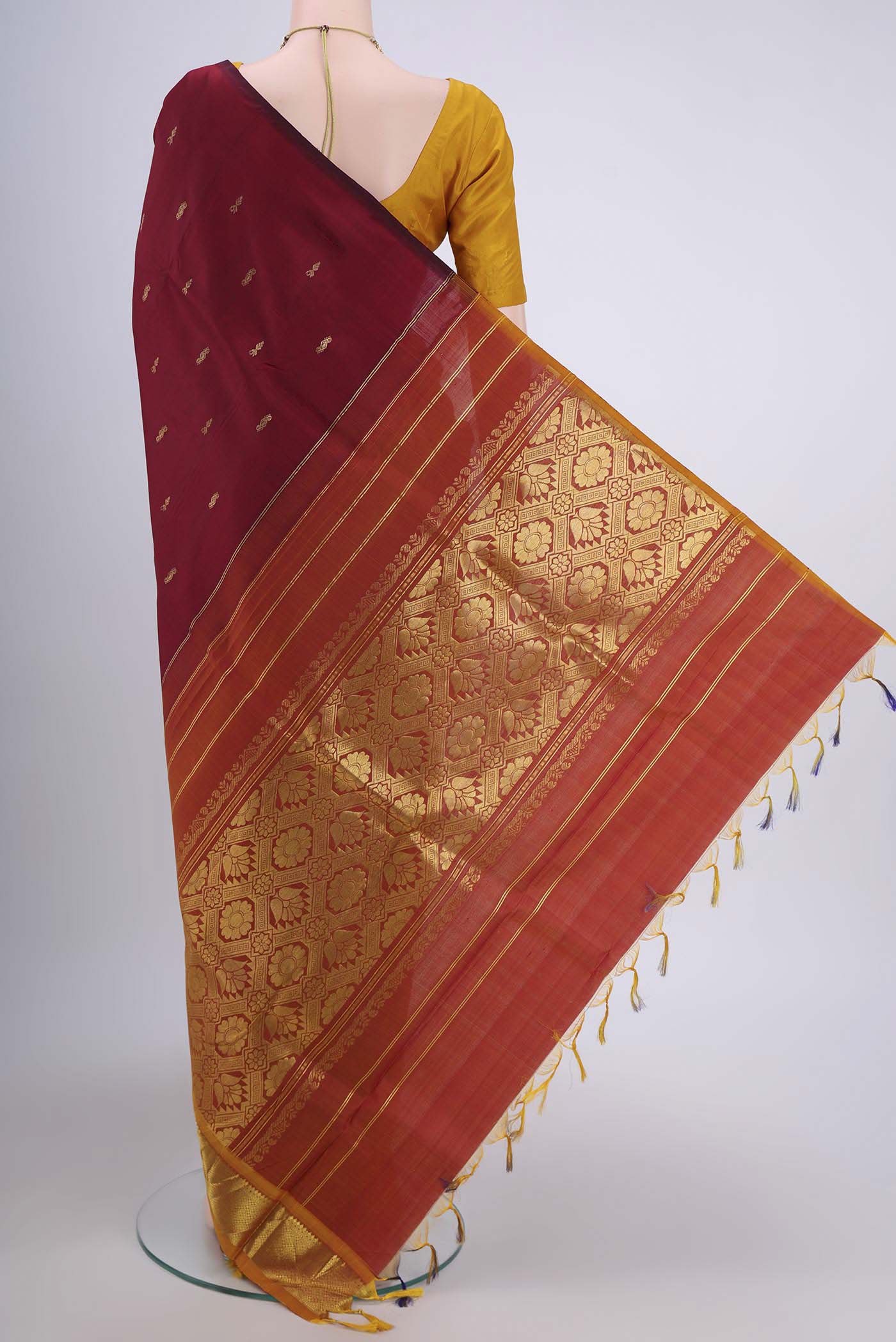 Flat view of Green Kanjivaram Silk Saree with Zari Butta on the body and One Side Border. 