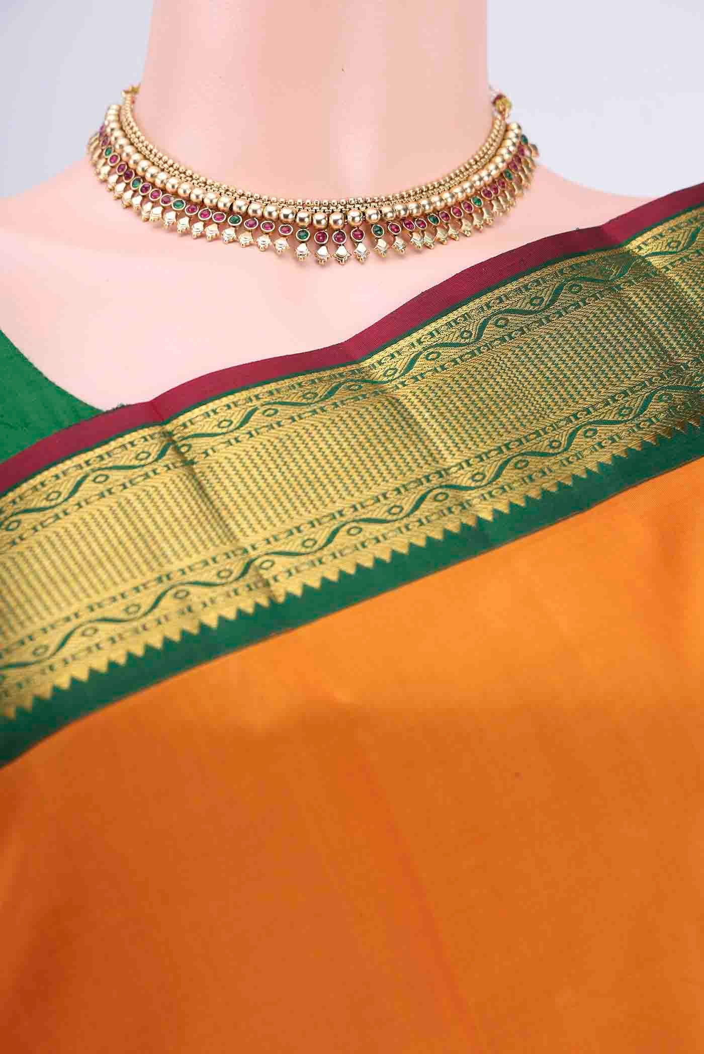 Border image of Yellow Kanchipuram Saree with Plain Body and Zari Border. 