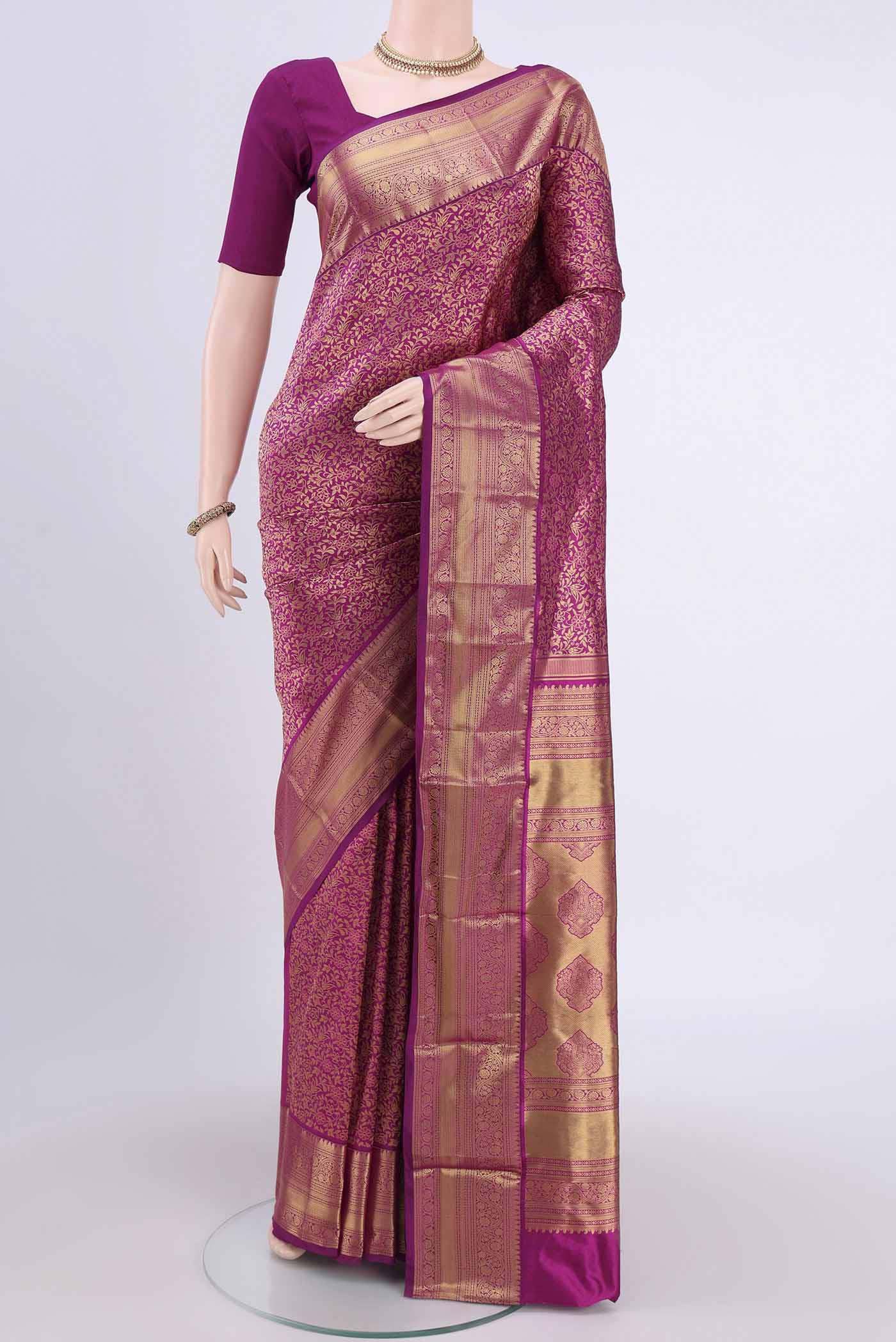 Magenta Bangalore Silk Saree with Zari Brocade on the body and Zari Border.  displayed on a mannequin