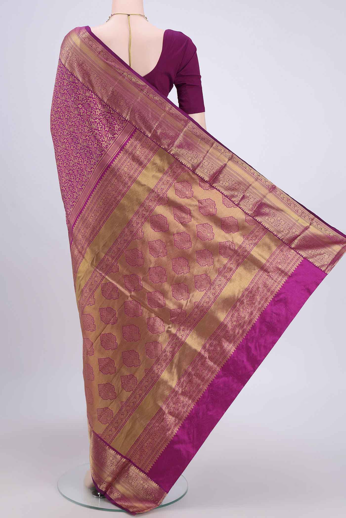 Flat view of Magenta Bangalore Silk Saree with Zari Brocade on the body and Zari Border. 