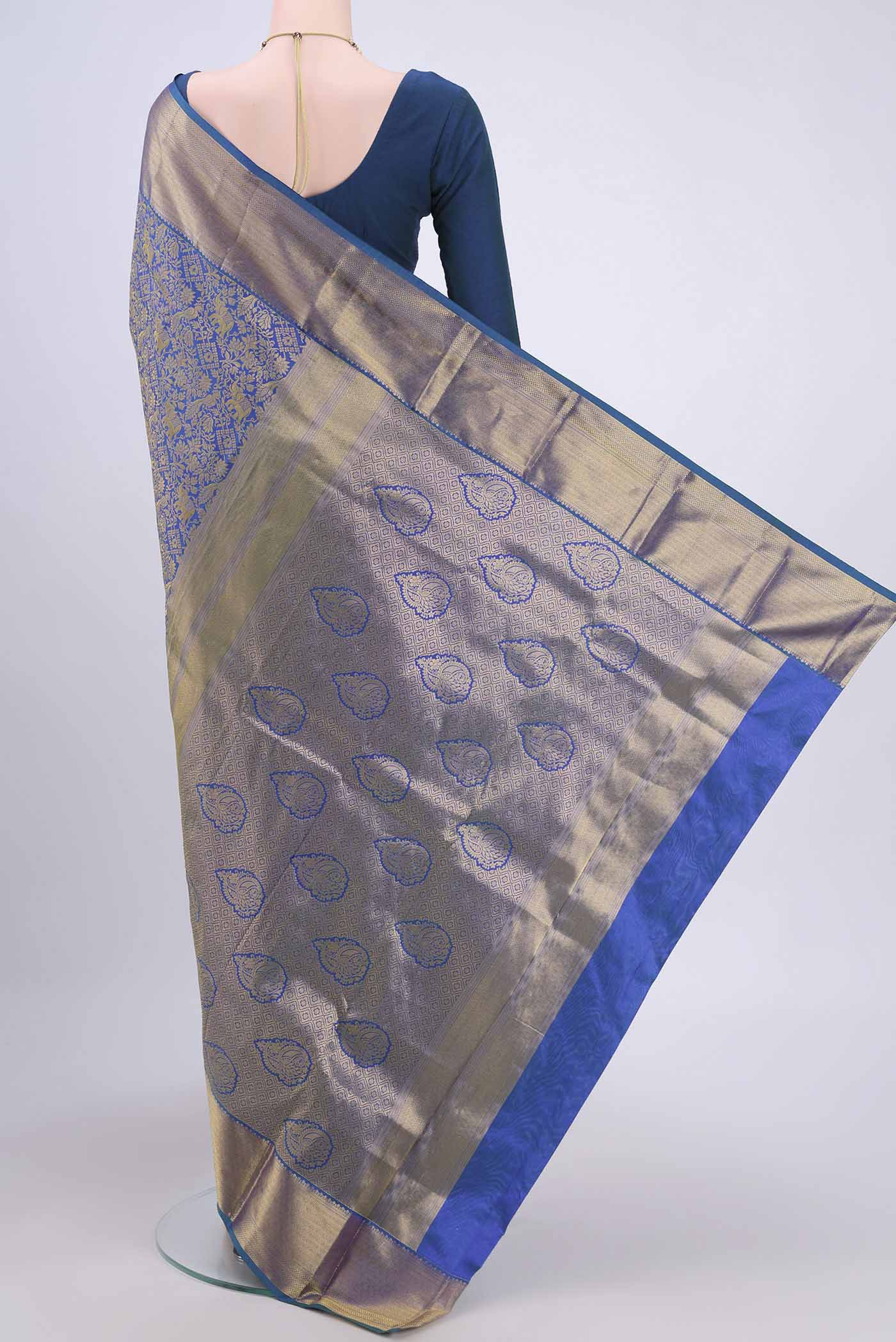 Flat view of Blue Dual Tone Bangalore Silk Saree with Zari Brocade on the body and Zari Border. 