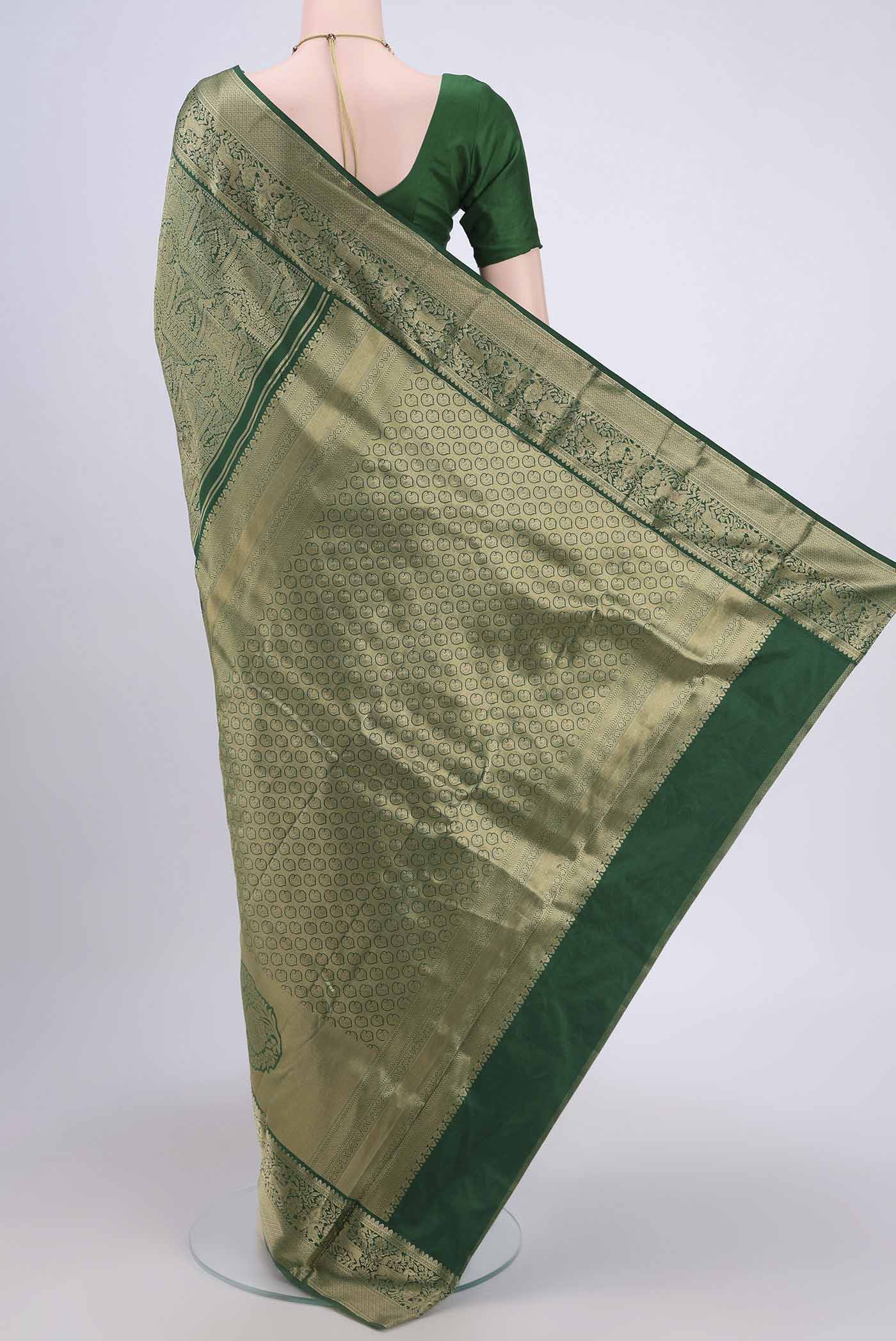 Flat view of Bottle Green Dual Tone Bangalore Silk Saree with Zari Brocade on the body and Zari Border. 
