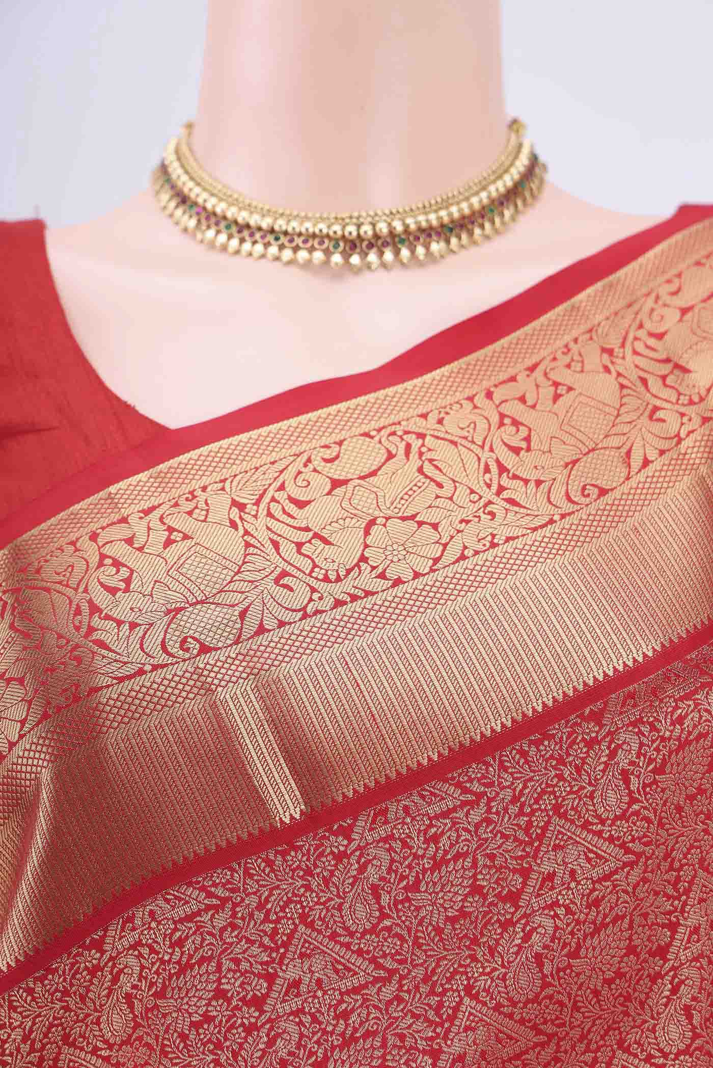 Border image of Imperial Red Bangalore Silk Saree with Zari Brocade on the body and Zari Border. 