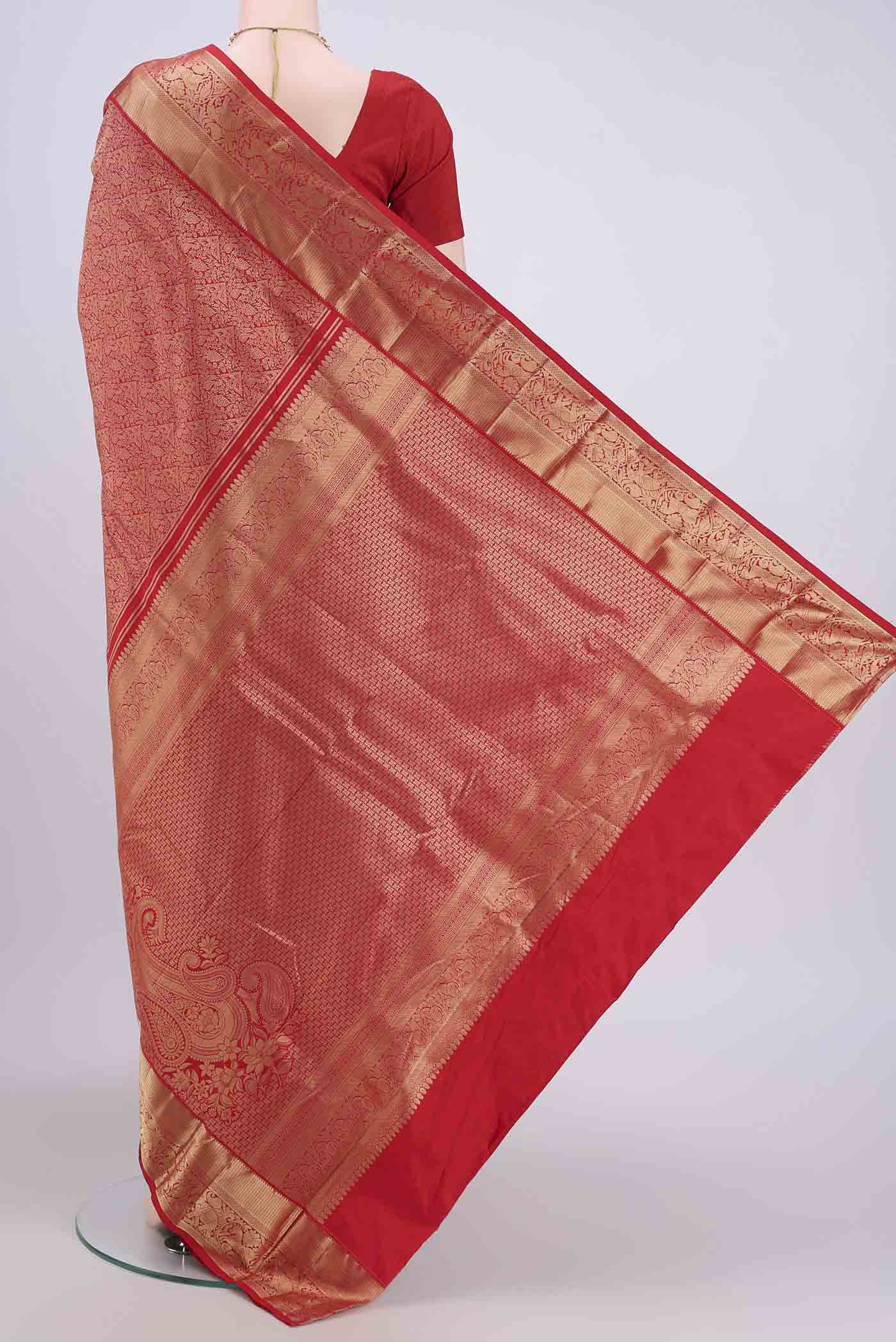 Flat view of Imperial Red Bangalore Silk Saree with Zari Brocade on the body and Zari Border. 