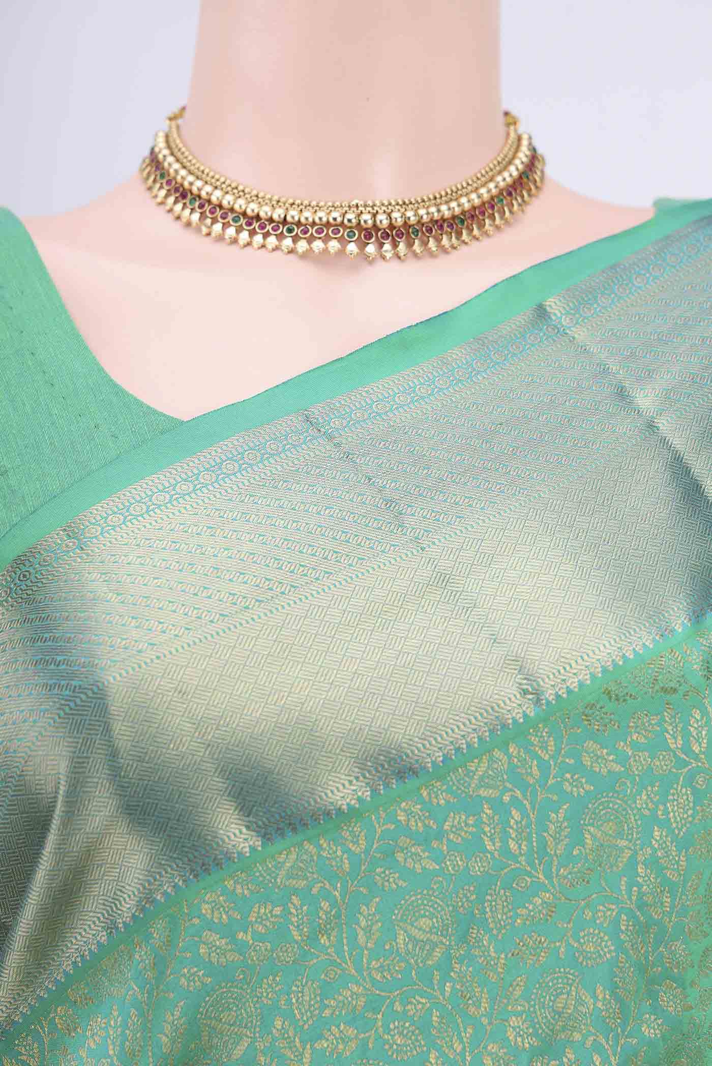Border image of Sea Green Kanchipuram Saree with Zari Brocade on the body and Rising Temple Border. 