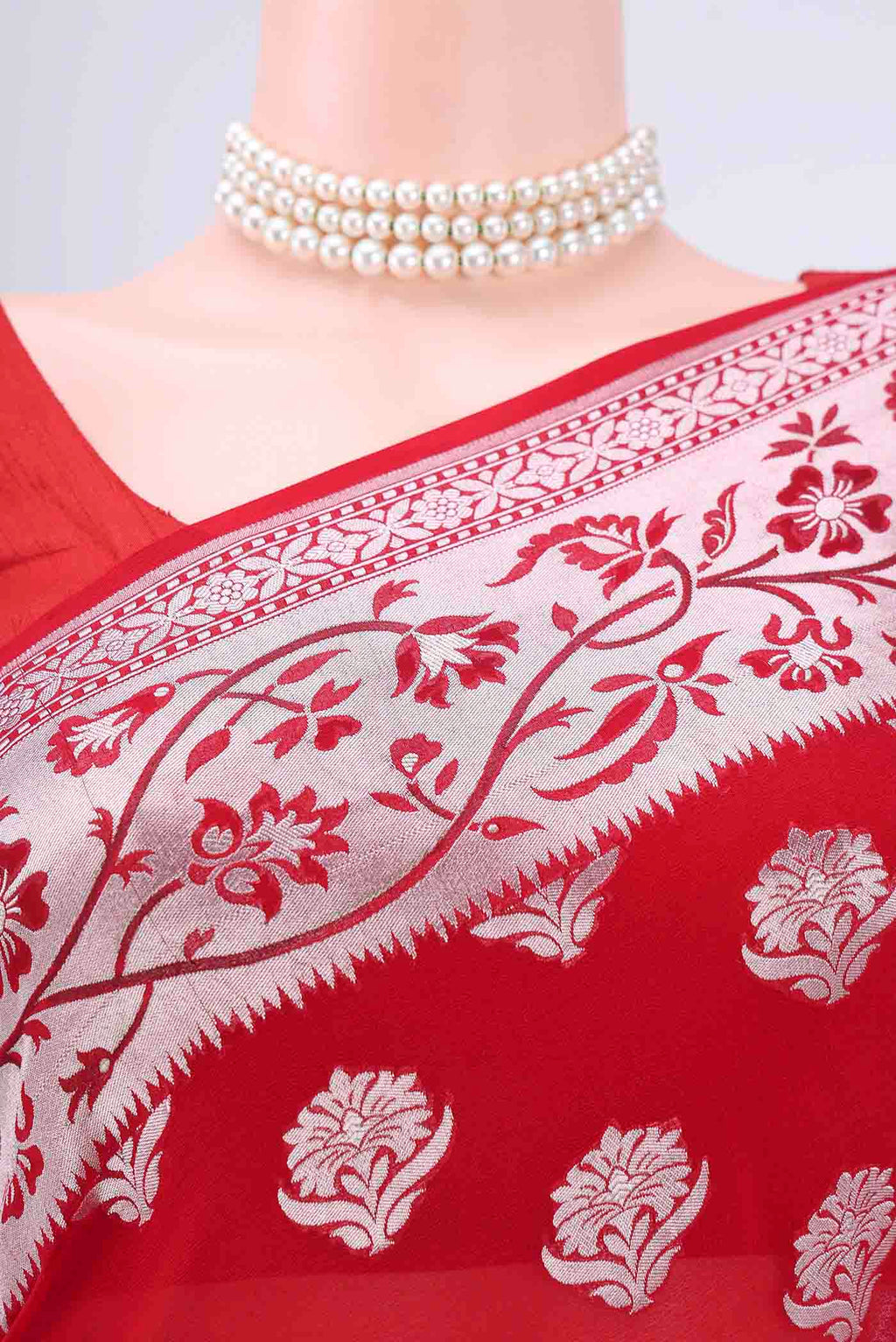 Border image of Red Banarasi Georgette Saree with Zari Brocade on the body and Zari Border. 