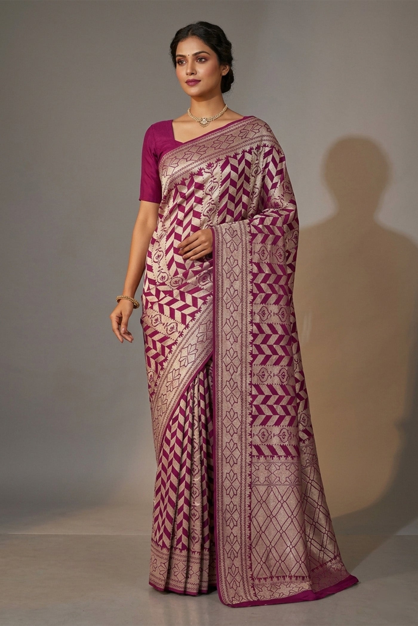 Model wearing a Purple Banarasi Georgette Saree with Zari Brocade on the body and Zari Border.