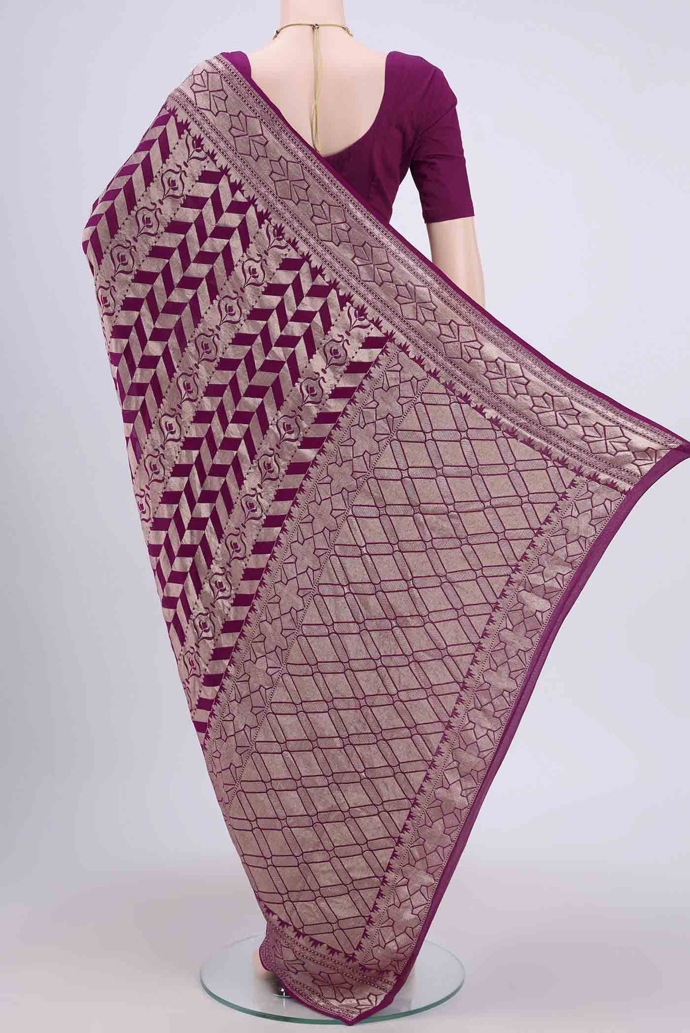 Flat view of Purple Banarasi Georgette Saree with Zari Brocade on the body and Zari Border. 
