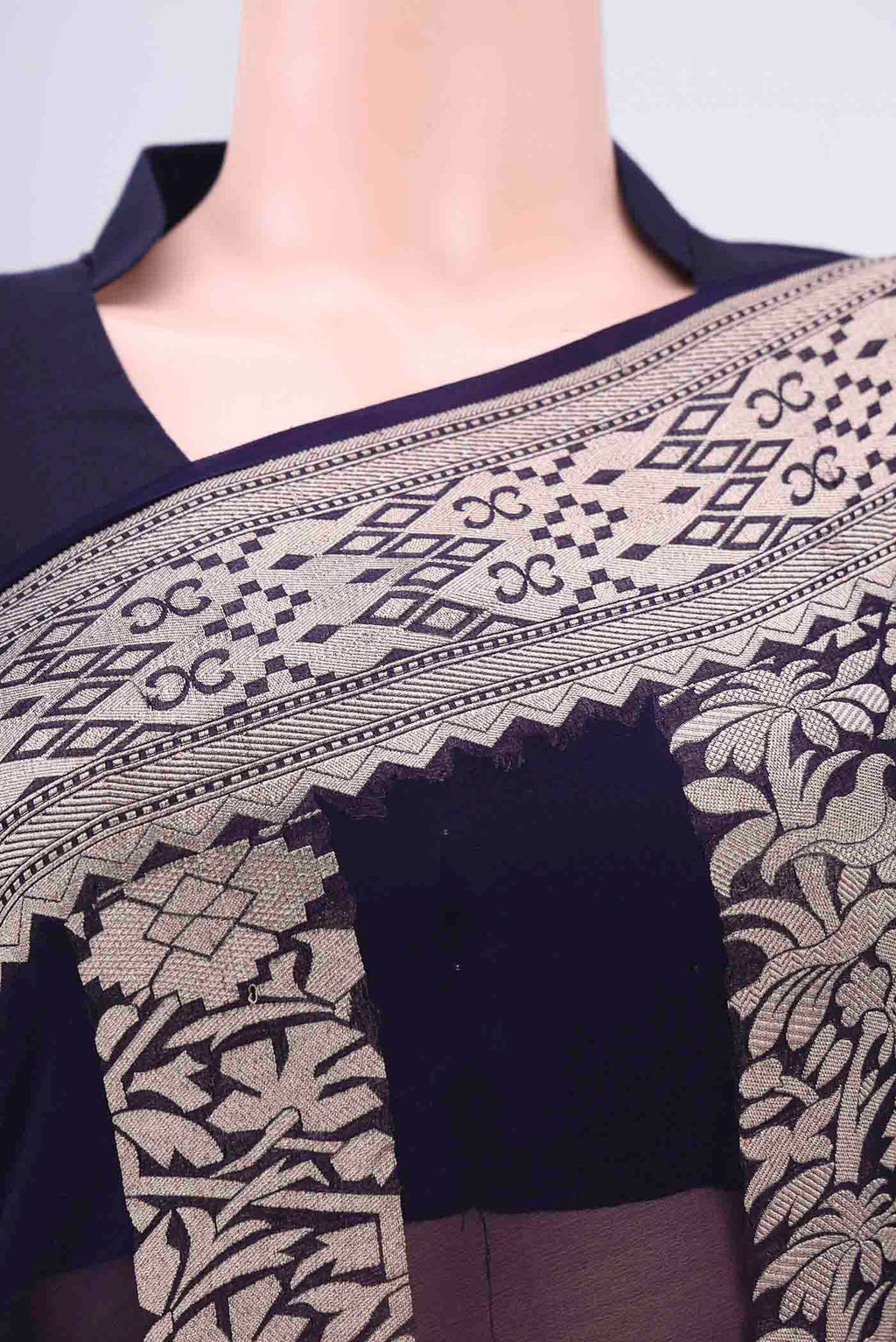 Border image of Navy Blue Banarasi Georgette Saree with Zari Brocade on the body and Zari Border. 