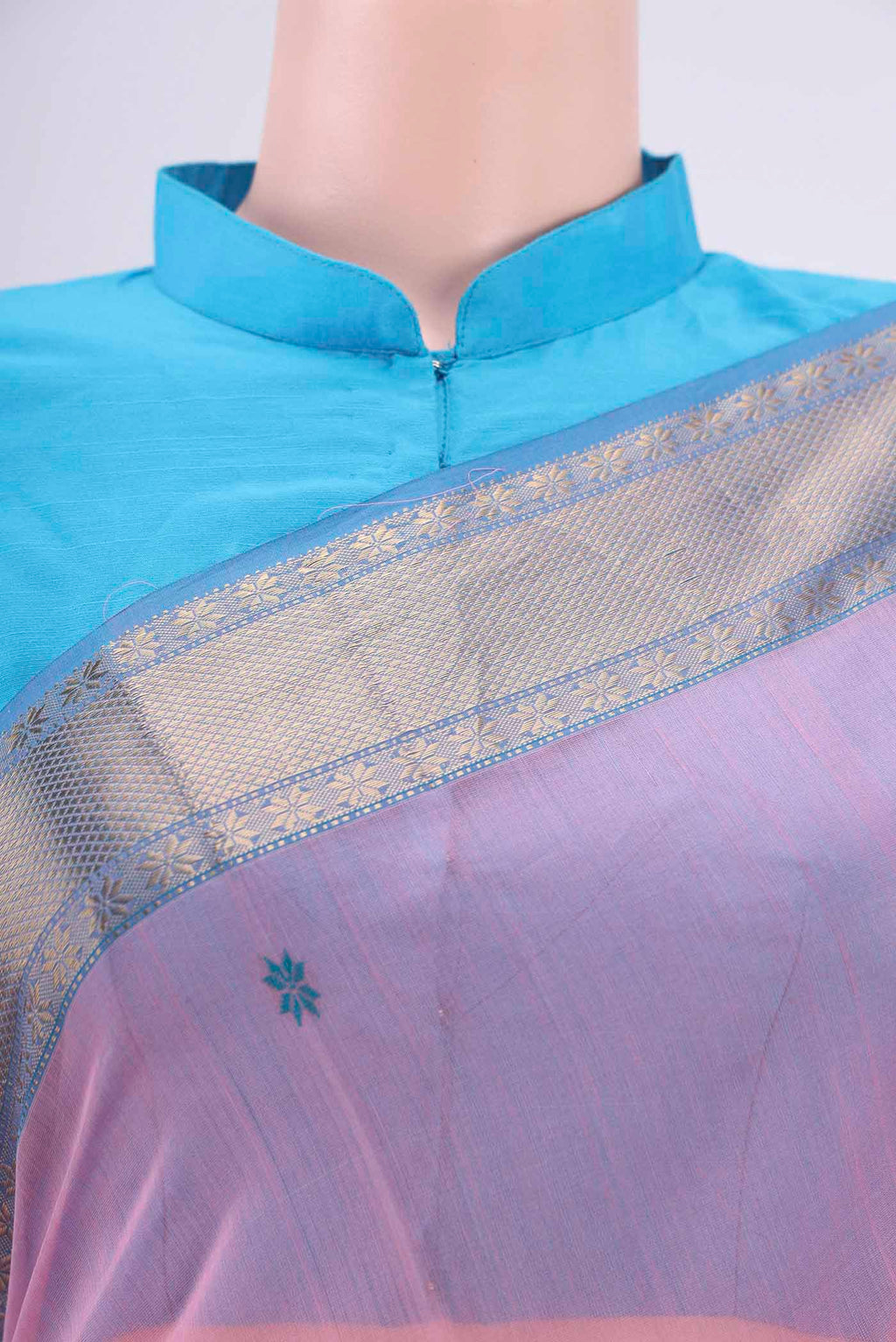 Border image of Pink Maheshwari Silk Cotton Saree with Stripes on the body and Zari Border. 