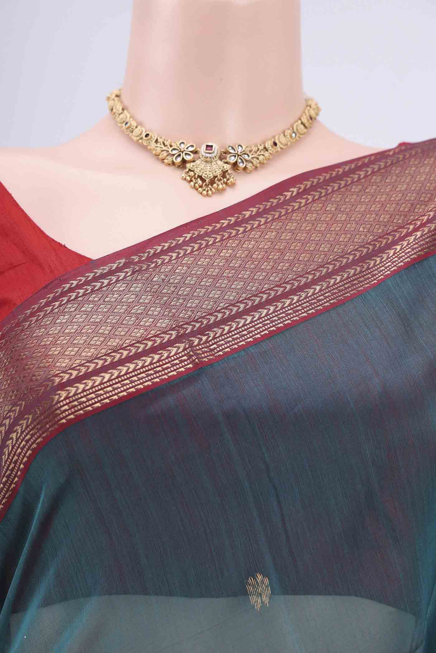 Border image of Blue Maheshwari Silk Cotton Saree with Stripes on the body and Zari Border. 