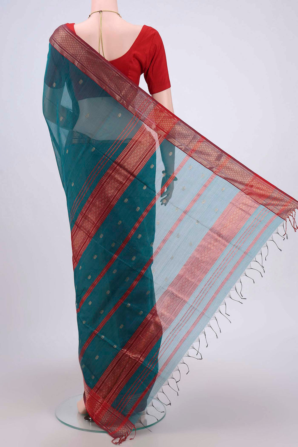 Flat view of Blue Maheshwari Silk Cotton Saree with Stripes on the body and Zari Border. 