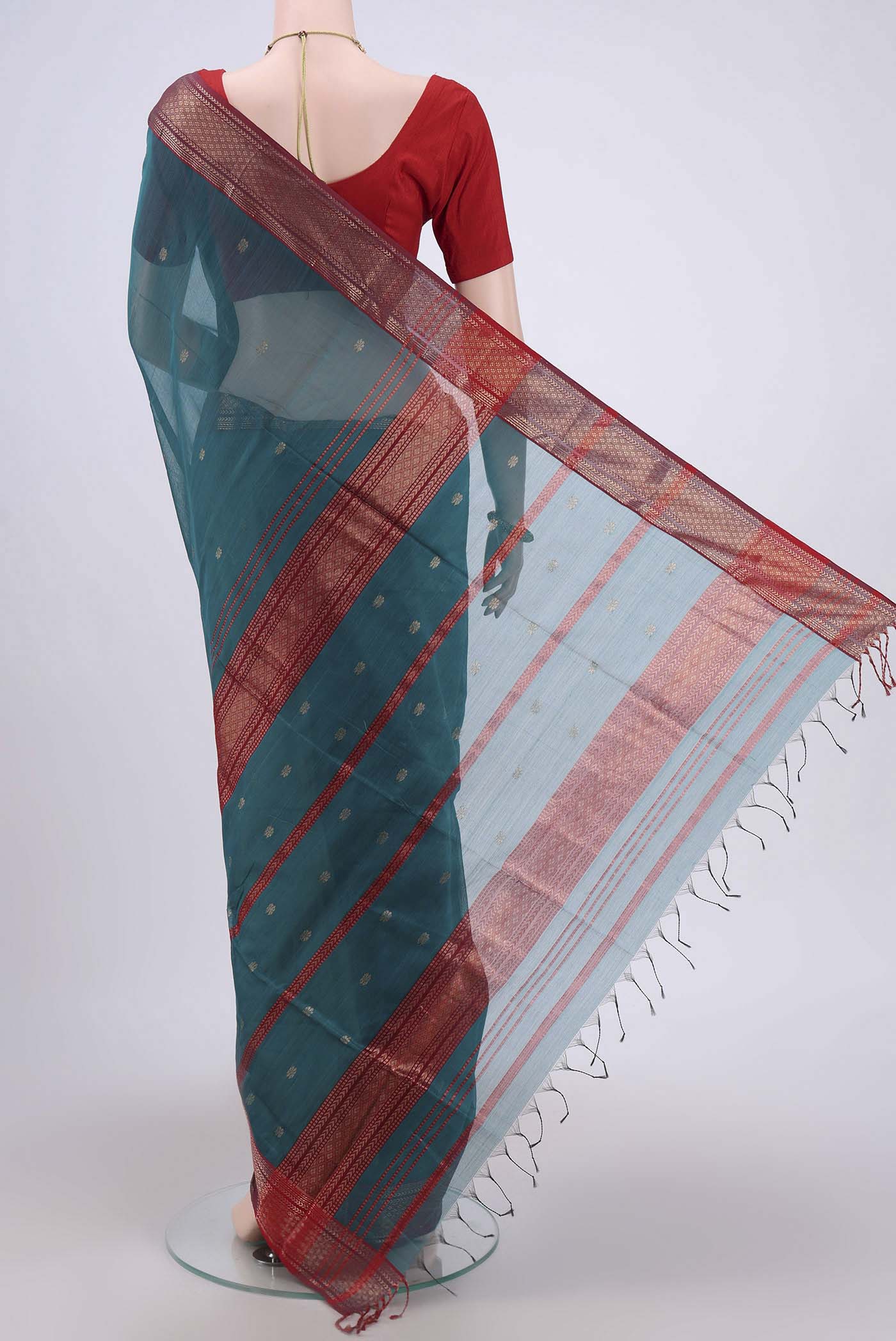 Flat view of Blue Maheshwari Silk Cotton Saree with Stripes on the body and Zari Border. 