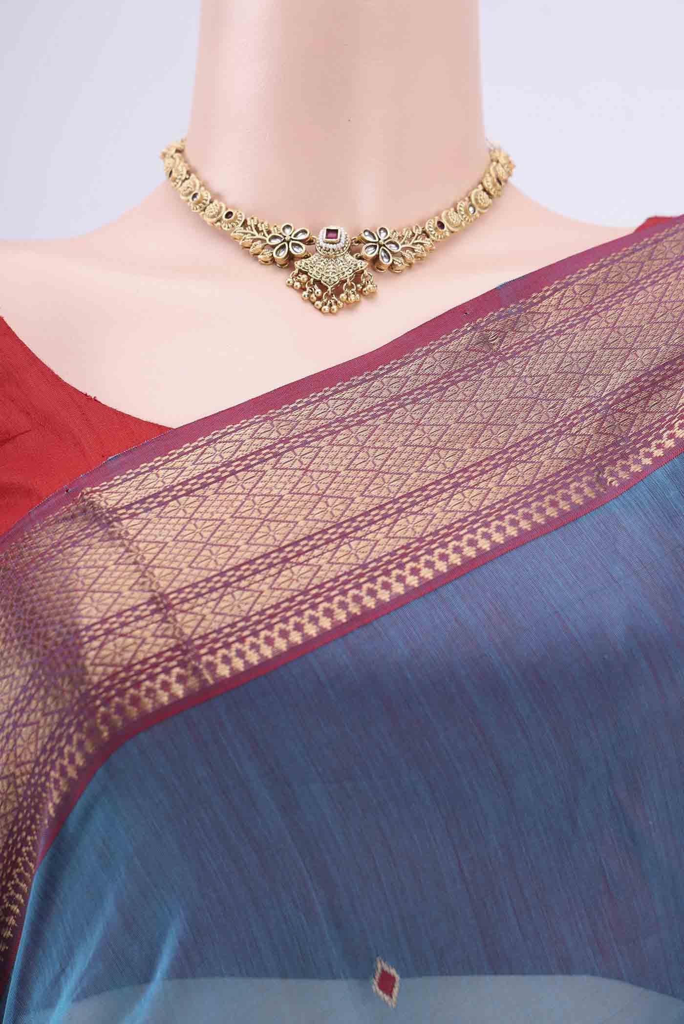 Border image of Blue Maheshwari Silk Cotton Saree with Stripes on the body and Zari Border. 