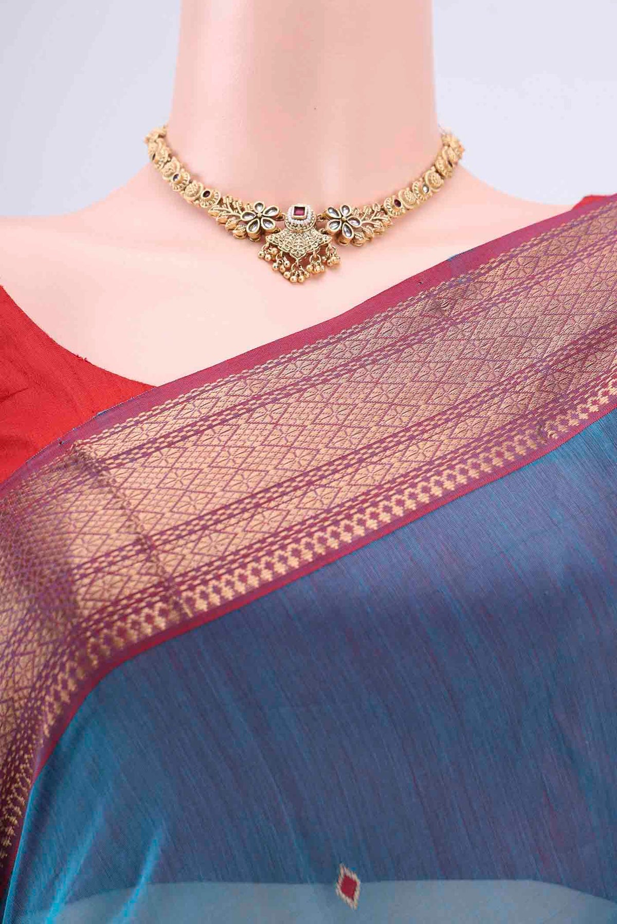 Border image of Blue Maheshwari Silk Cotton Saree with Stripes on the body and Zari Border. 