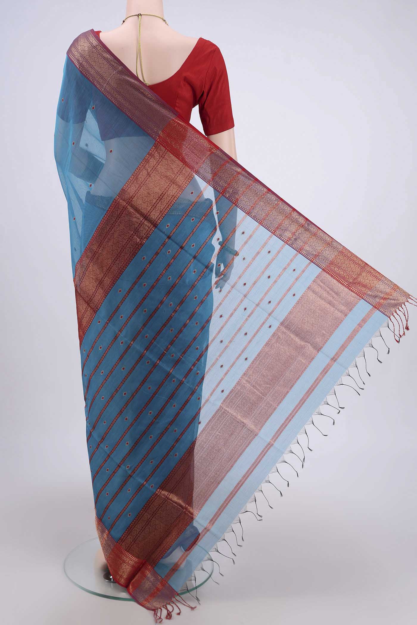 Flat view of Blue Maheshwari Silk Cotton Saree with Stripes on the body and Zari Border. 