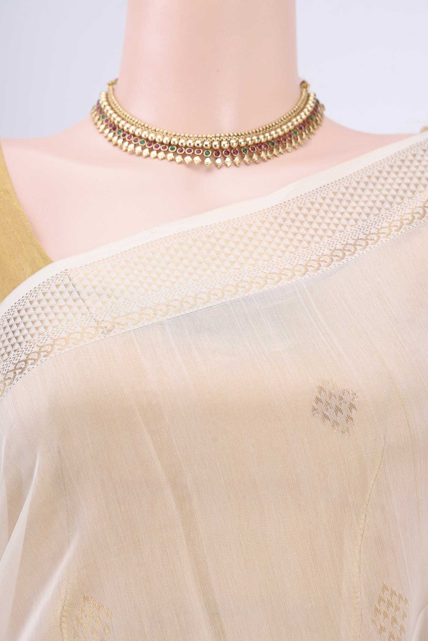 Border image of Off White Maheshwari Silk Cotton Saree with Zari Butta on the body and Zari Border. 