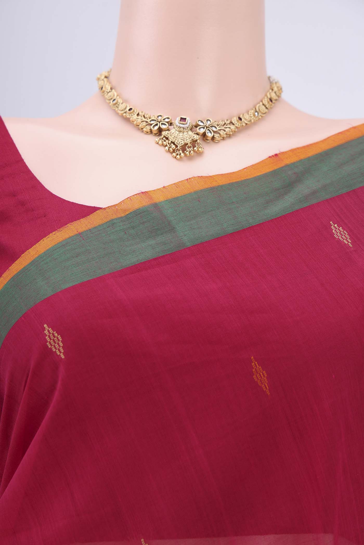 Border image of Dark Pink Coimbatore Cotton Saree with Thread Butta on the body and Zari Border. 