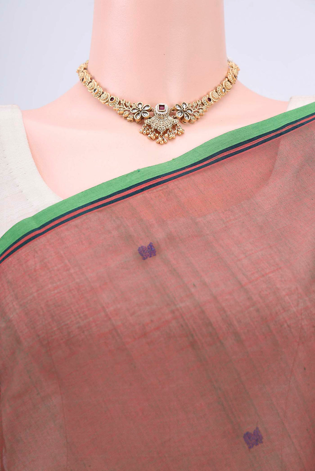 Border image of Rust Coimbatore Cotton Saree with Thread Butta on the body and Plain Border. 