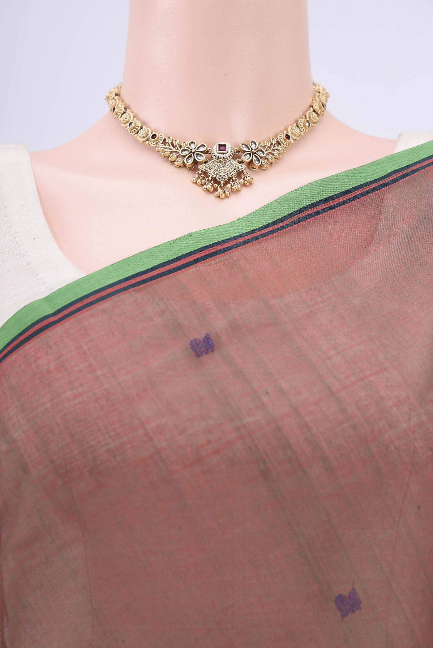 Border image of Rust Coimbatore Cotton Saree with Thread Butta on the body and Plain Border. 