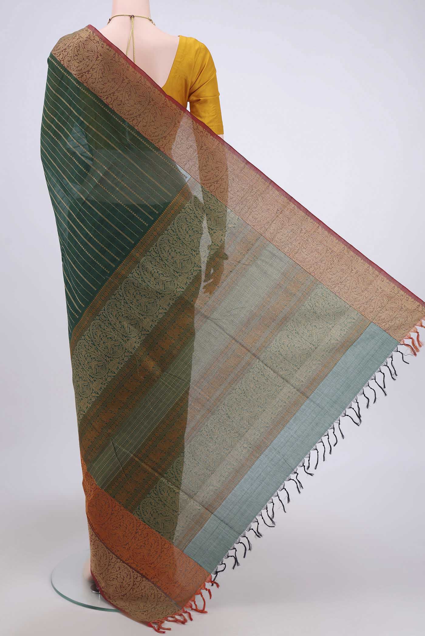 Flat view of Bottle Green Coimbatore Cotton Saree with Stripes on the body and Plain Border. 