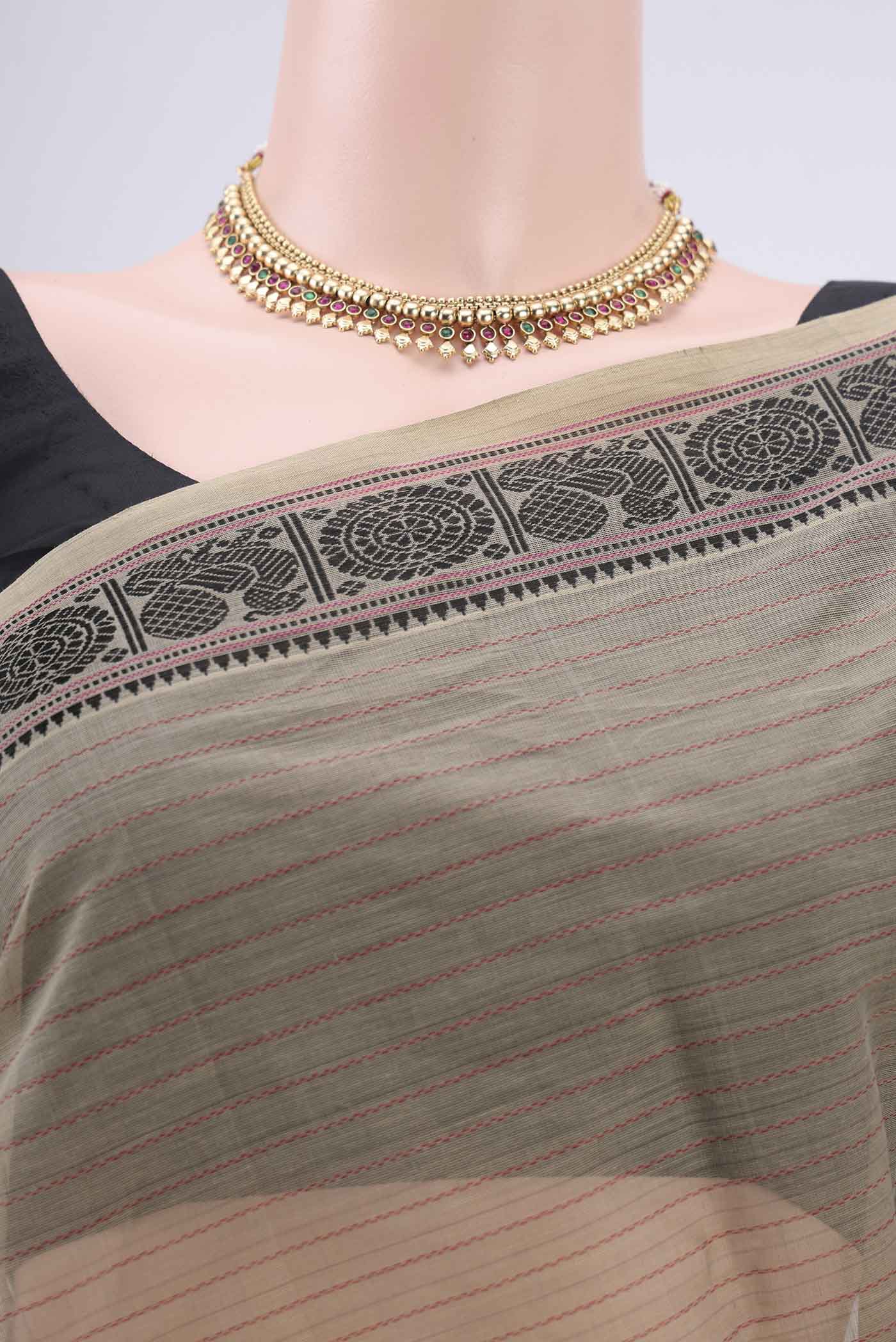 Border image of Dark Beige Kanchi Cotton Saree with Stripes on the body and Thread Border. 