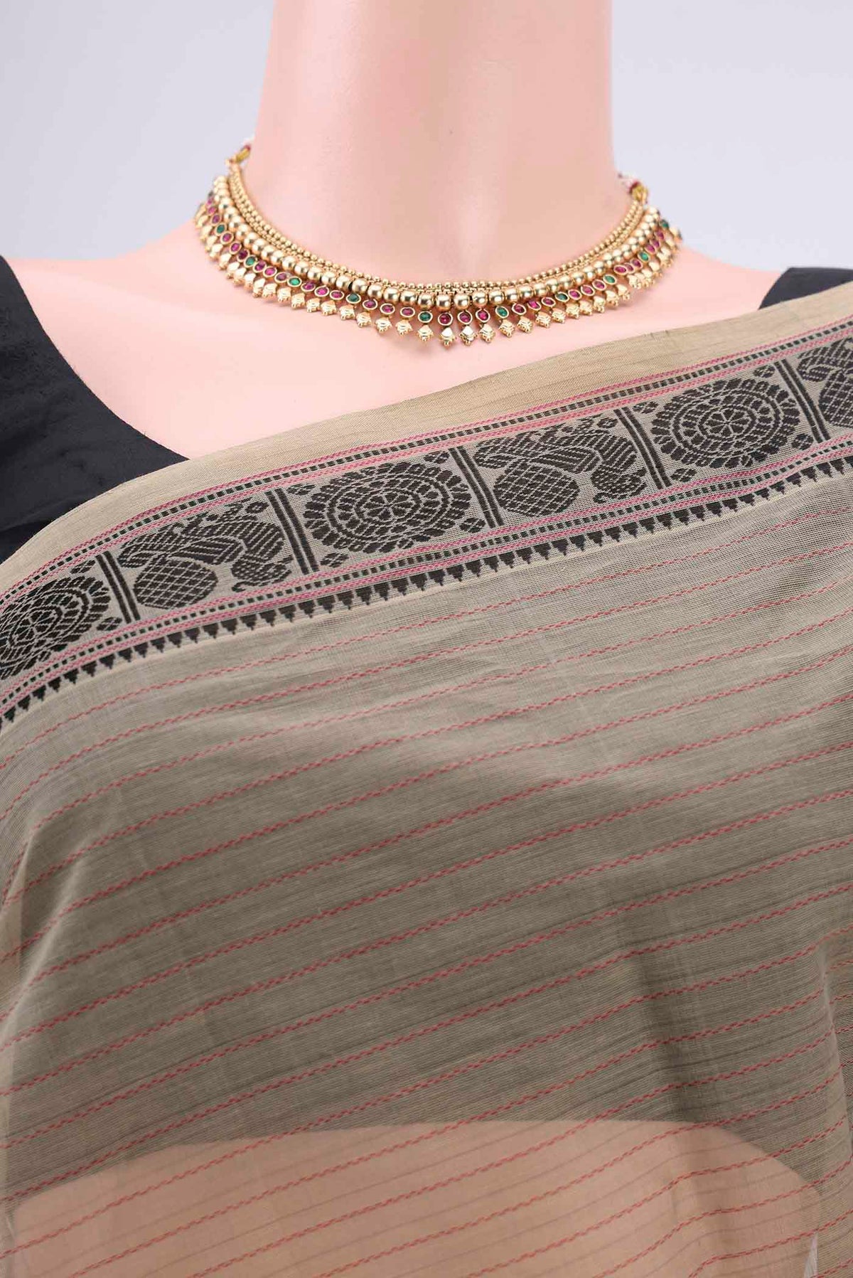 Border image of Dark Beige Kanchi Cotton Saree with Stripes on the body and Thread Border. 