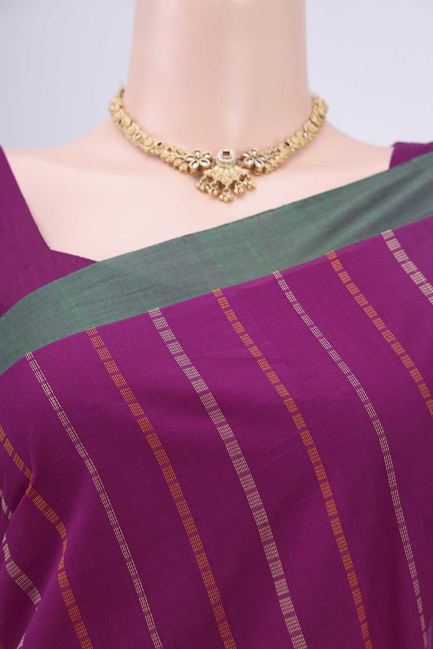 Border image of Magenta Coimbatore Cotton Saree with Stripes on the body and Zari Border. 