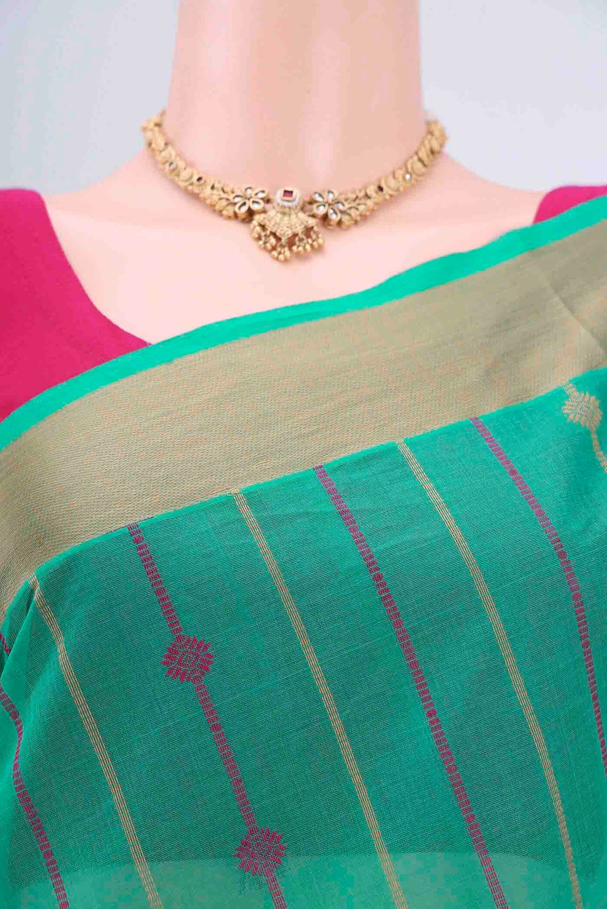 Border image of Turquoise Coimbatore Cotton Saree with Stripes on the body and Zari Border. 