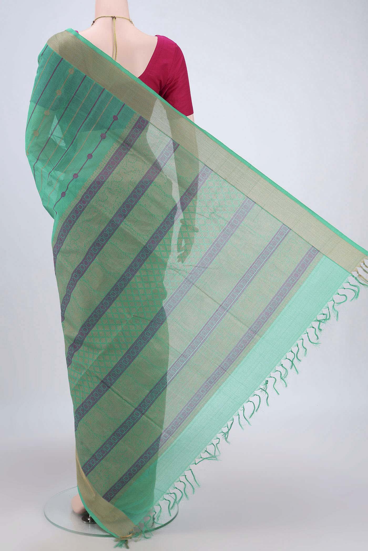 Flat view of Turquoise Coimbatore Cotton Saree with Stripes on the body and Zari Border. 