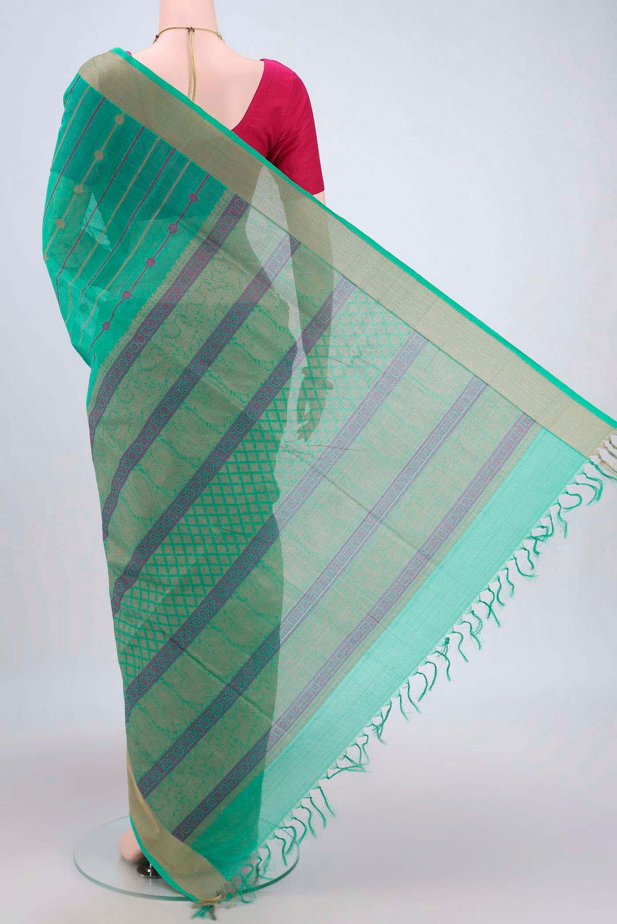 Flat view of Turquoise Coimbatore Cotton Saree with Stripes on the body and Zari Border. 