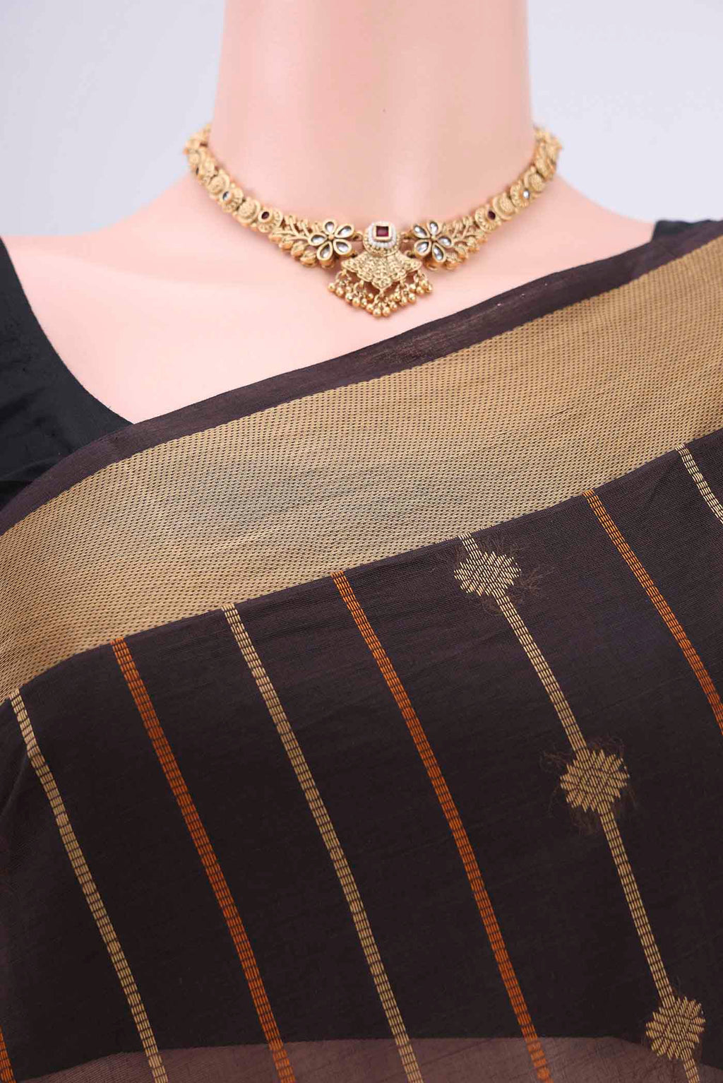 Border image of Coffee Brown Coimbatore Cotton Saree with Stripes on the body and Plain Border. 