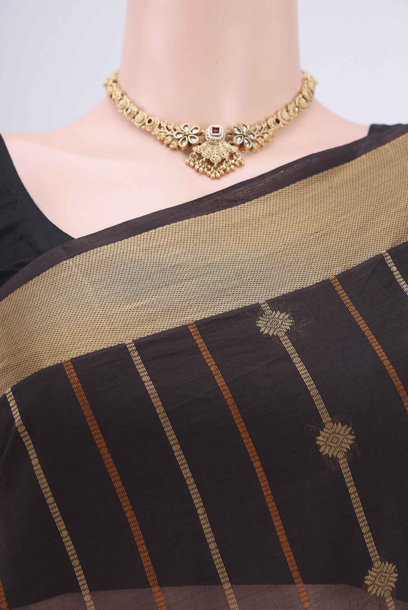 Border image of Coffee Brown Coimbatore Cotton Saree with Stripes on the body and Plain Border. 
