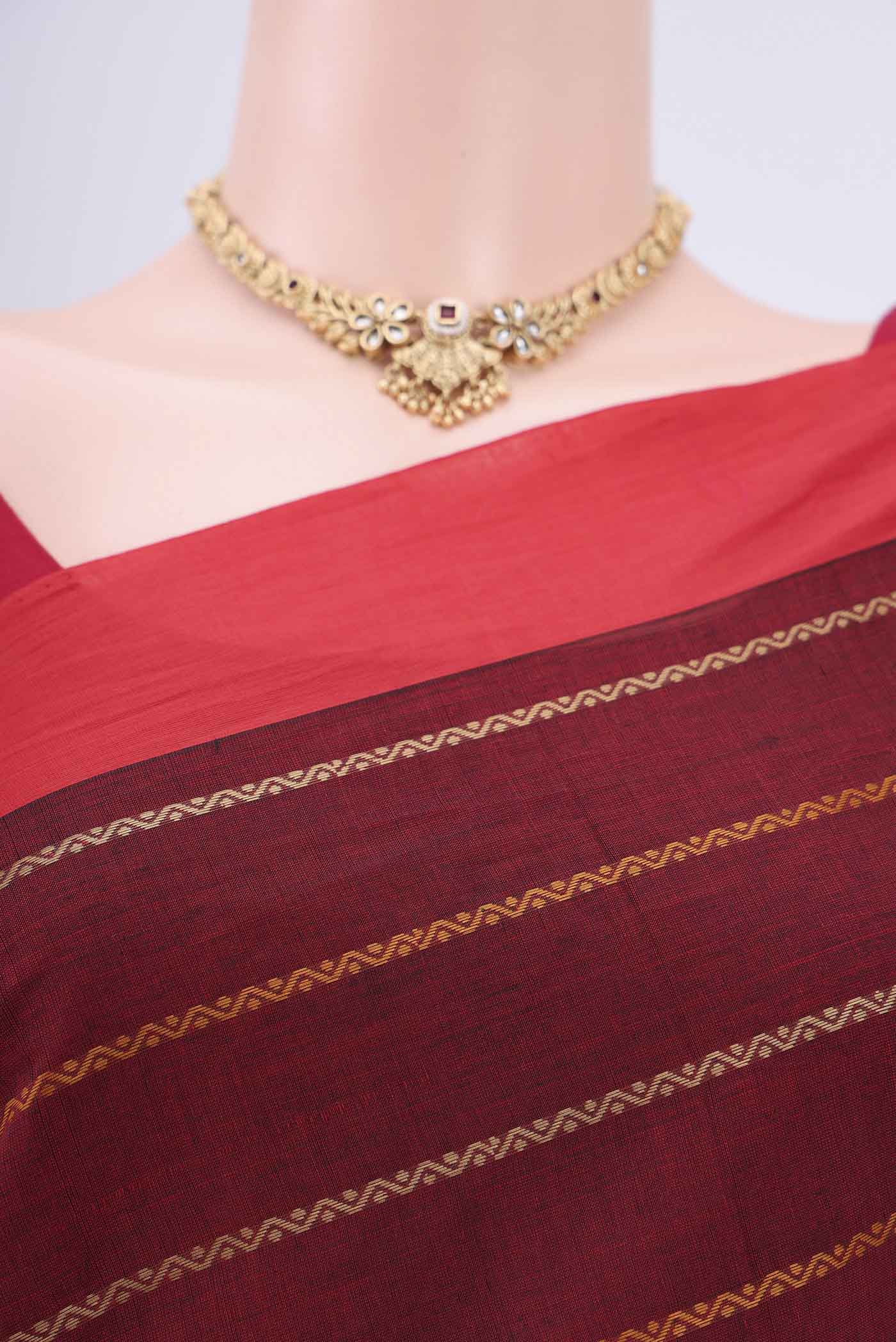 Border image of Maroon Coimbatore Cotton Saree with Stripes on the body and Plain Border. 