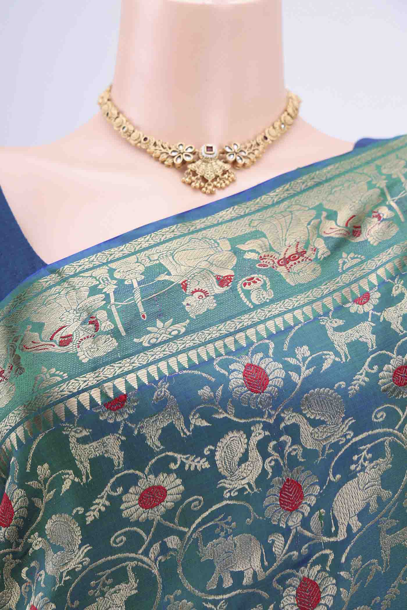 Border image of Peacock Blue Dual Tone Baluchari Silk Saree with Zari Brocade on the body and Zari Border. 