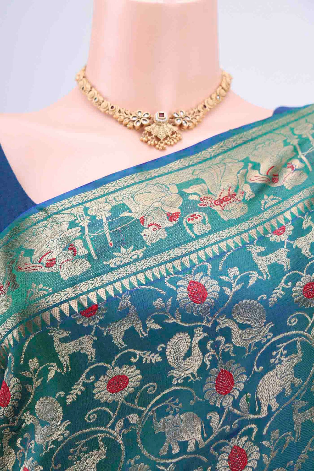 Border image of Peacock Blue Dual Tone Baluchari Silk Saree with Zari Brocade on the body and Zari Border. 