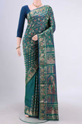 Peacock Blue Dual Tone Baluchari Silk Saree with Zari Brocade on the body and Zari Border.  displayed on a mannequin