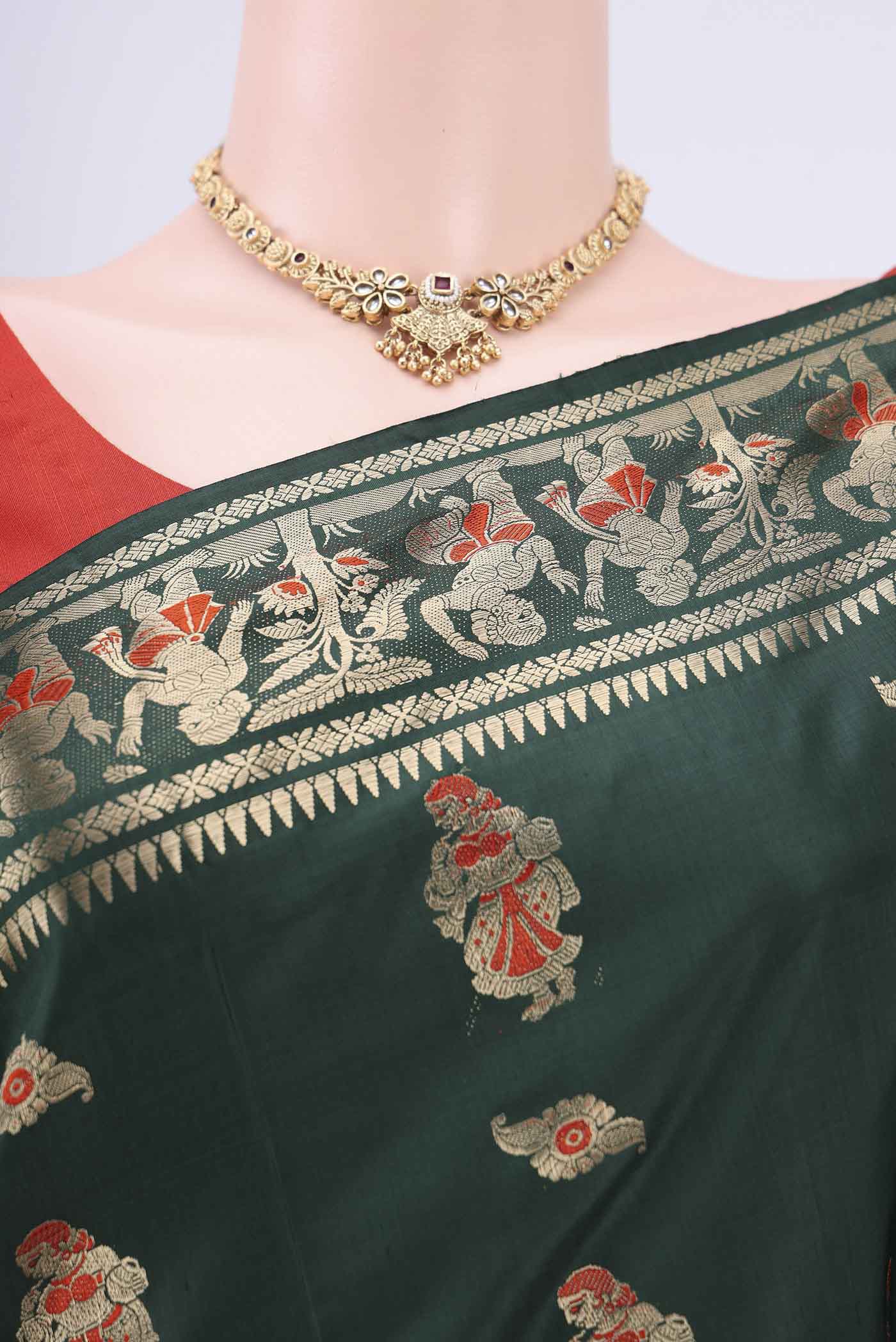 Border image of Bottle Green Dual Tone Baluchari Silk Saree with Zari And Thread Butta on the body and Meenakari Border. 