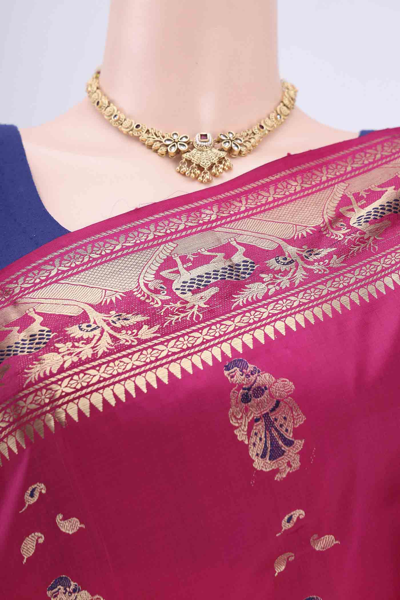 Border image of Rani Pink Dual Tone Baluchari Silk Saree with Zari Butta on the body and Zari Border. 