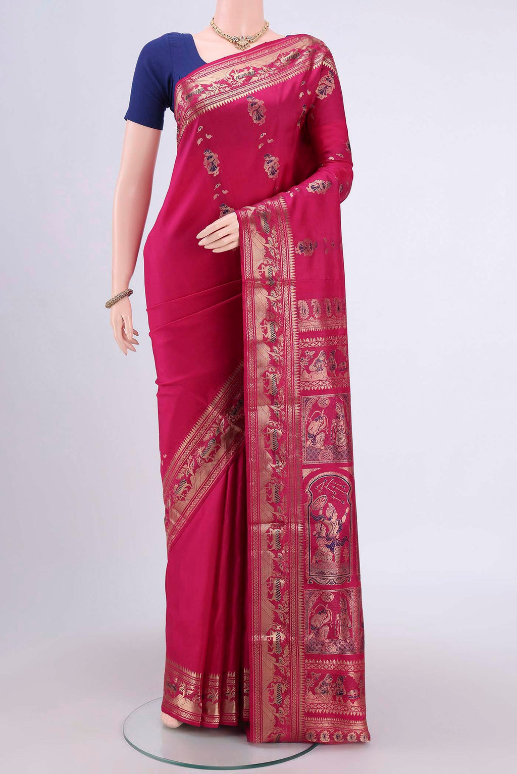 Rani Pink Dual Tone Baluchari Silk Saree with Zari Butta on the body and Zari Border.  displayed on a mannequin