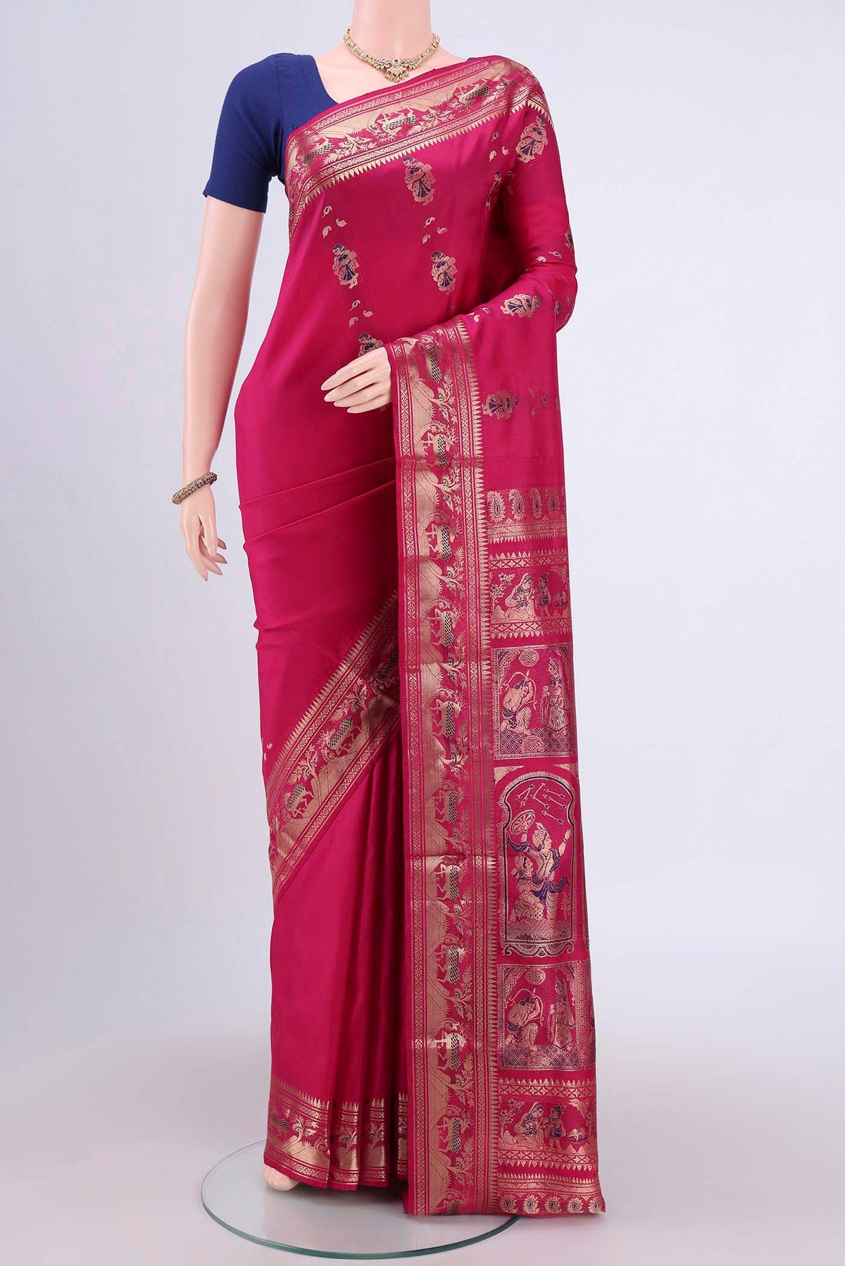 Rani Pink Dual Tone Baluchari Silk Saree with Zari Butta on the body and Zari Border.  displayed on a mannequin