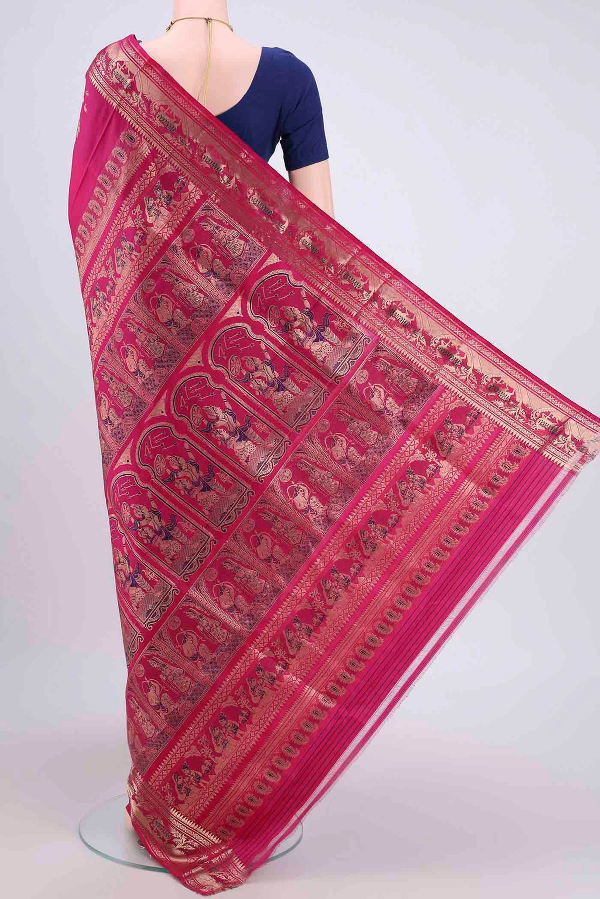 Flat view of Rani Pink Dual Tone Baluchari Silk Saree with Zari Butta on the body and Zari Border. 