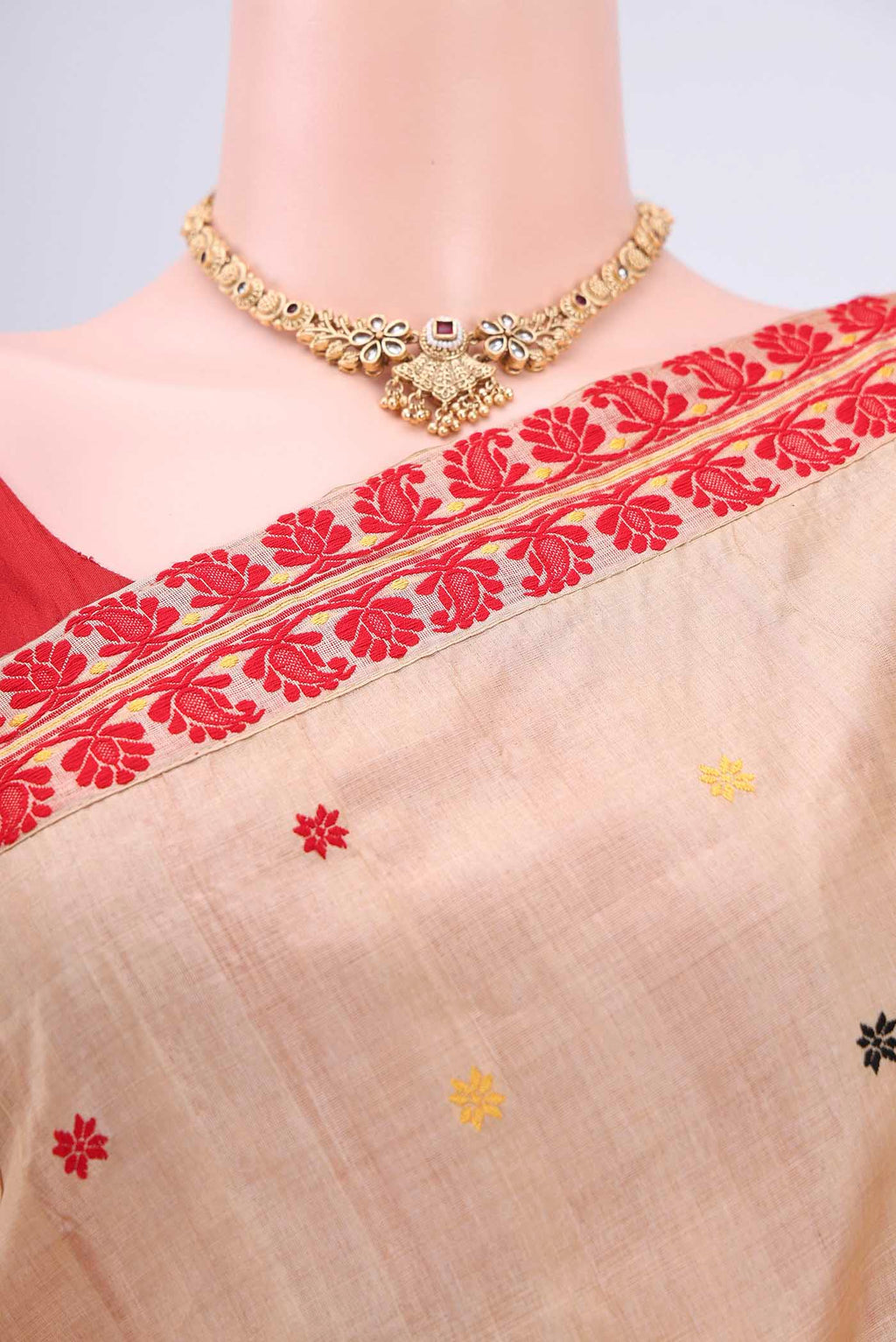 Border image of Dark Beige Assam Silk Saree with Thread Butta on the body and Thread Border. 