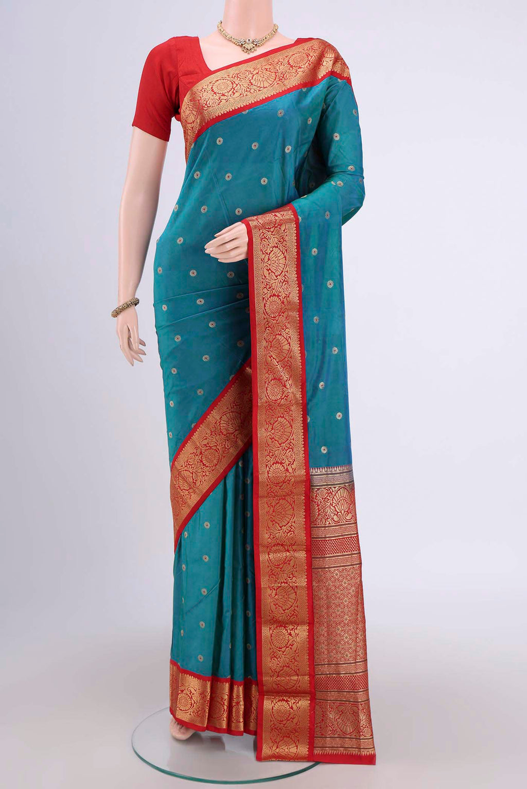 Blue Dual Tone Blended Bangalore Silk Saree with Zari Butta on the body and Zari Border.  displayed on a mannequin
