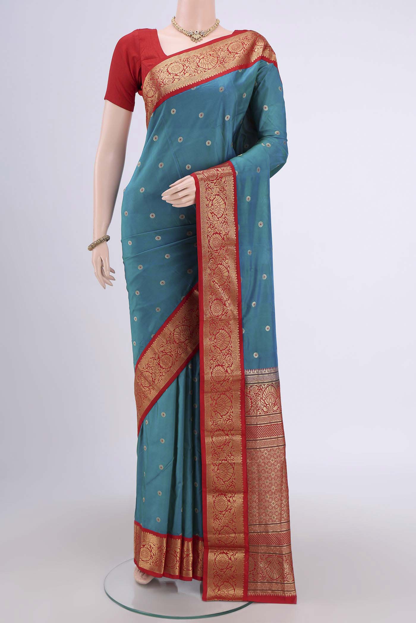 Blue Dual Tone Blended Bangalore Silk Saree with Zari Butta on the body and Zari Border.  displayed on a mannequin