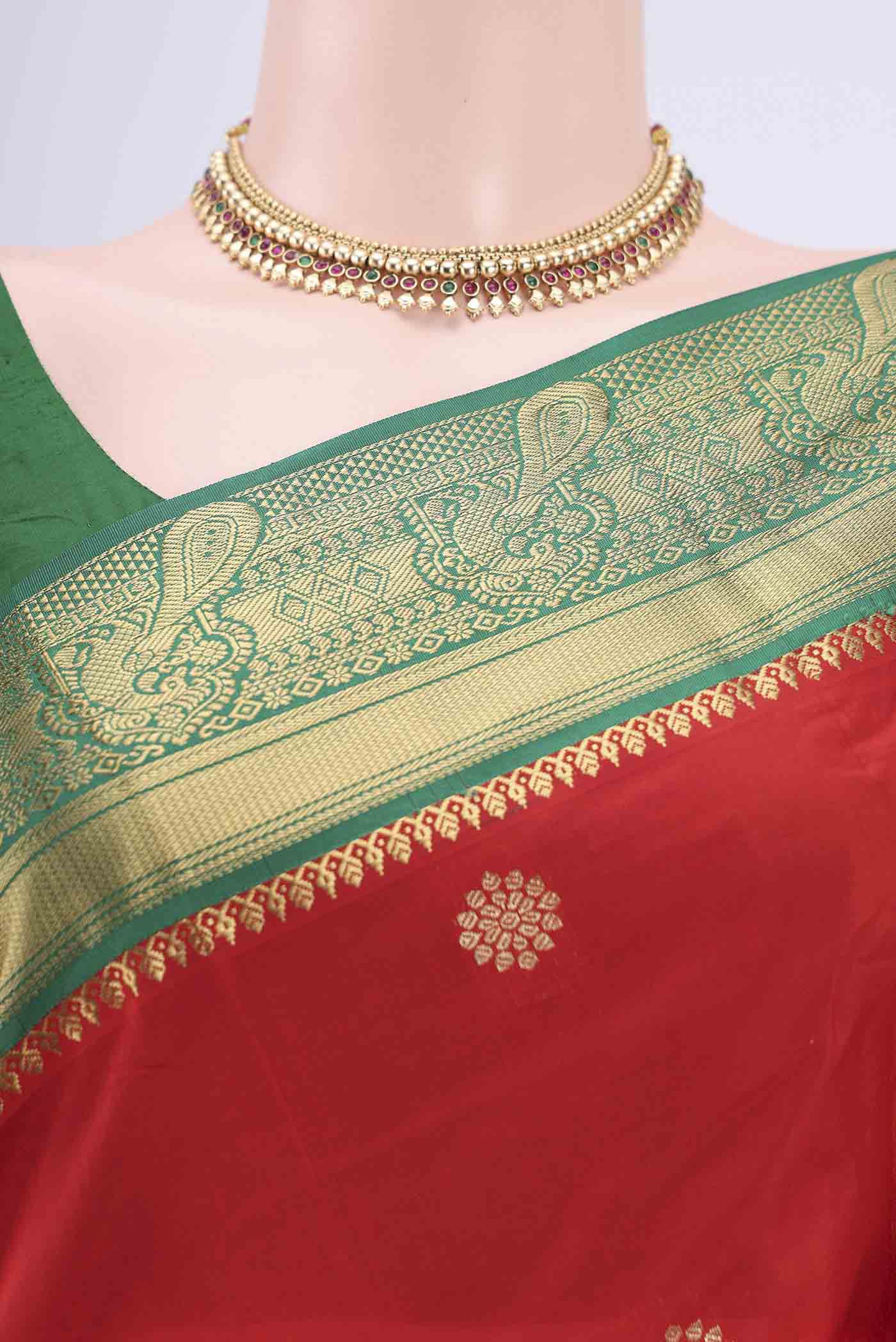 Border image of Red Blended Bangalore Silk Saree with Zari Butta on the body and Zari Border. 