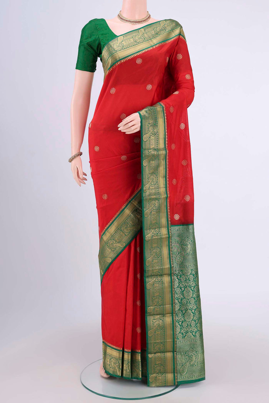 Red Blended Bangalore Silk Saree with Zari Butta on the body and Zari Border.  displayed on a mannequin