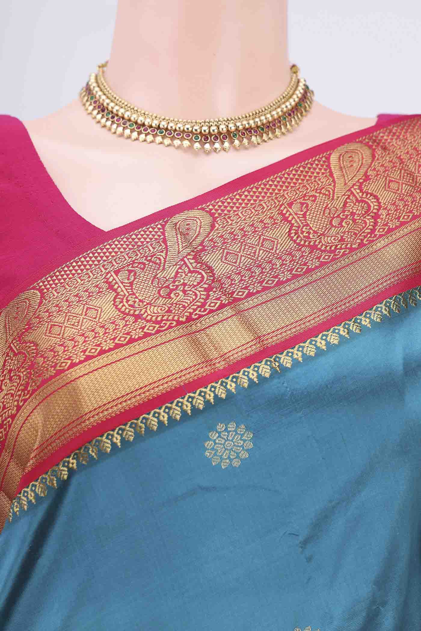 Border image of Blue Blended Bangalore Silk Saree with Zari Butta on the body and Zari Border. 