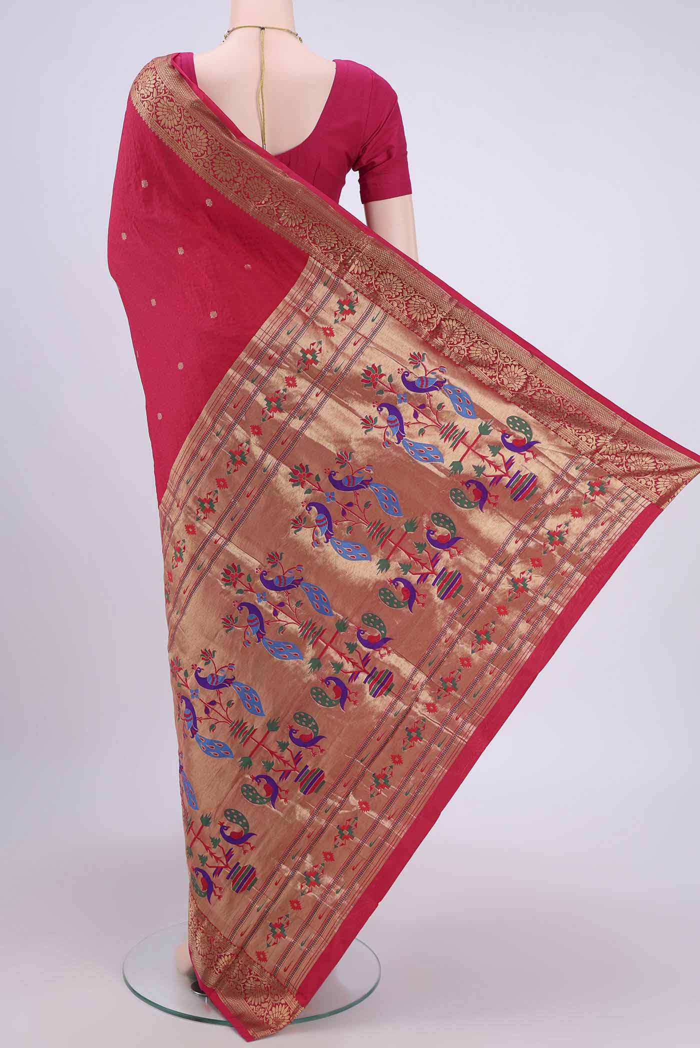 Flat view of Dark Pink Blended Bangalore Silk Saree with Jacquard With Zari Butta on the body and Zari Border. 