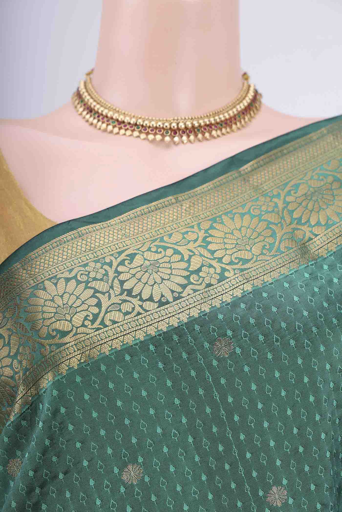 Border image of Sea Green Blended Bangalore Silk Saree with Jacquard With Zari Butta on the body and Zari Border. 